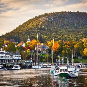 Mount Battie Looms over the picturesque Camden Harbor with some beautiful fall foliage on display.