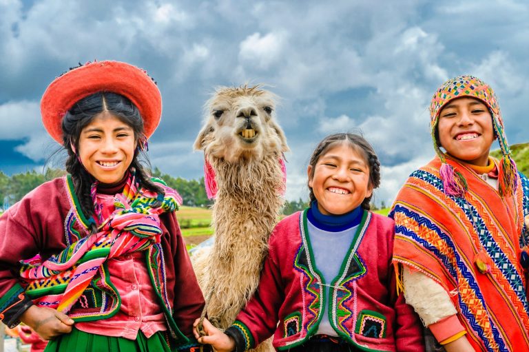 Peruvian-girls-with-lama-Peru-by-Art-In-Voyage-Magellan Odyssey Pt. 1 | The Peruvian Experience