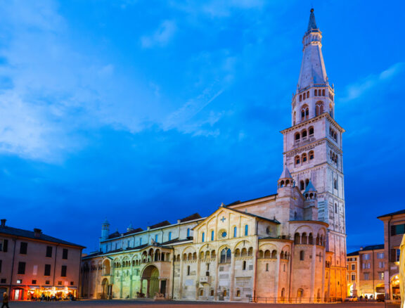 Modena, Italy, 20 october 2023 - Duomo di Modena (Cathedral of Modena) atnight in the center of the city