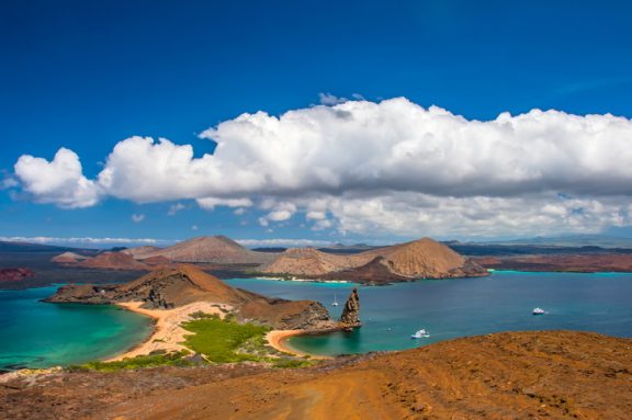 Galapagos. Ecuador. Panorama of the Galapagos Islands from the island of Bartolome. San Salvador island. Pinnacle Rock. Galapagos landscape. Ecuador travel